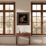 Palestinian artwork wood wall art above a console table between tall windows in a sunlit interior