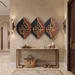 Islamic Wall Art with Arabic calligraphy panels above a console table in a luxurious entryway