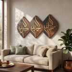 Islamic Wall Art with three Arabic calligraphy wood panels above a beige living room sofa