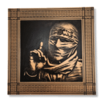 Abu Obaida Wall Art, engraved wood portrait of a masked man with raised finger and patterned border