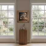 Abu Obaida Wall Art in a living room above a wood cabinet between two windows