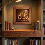 Abu Obaida Wall Art above a wooden desk in a warm, book-lined study nook