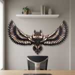 Bird wall art of a soaring owl with spread wings above a desk in a modern home office