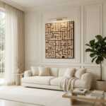 Islamic wall art with geometric Arabic calligraphy above a cream sofa in an elegant living room